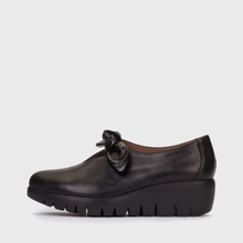 Load image into Gallery viewer, Black shoe with a bow on a white background
