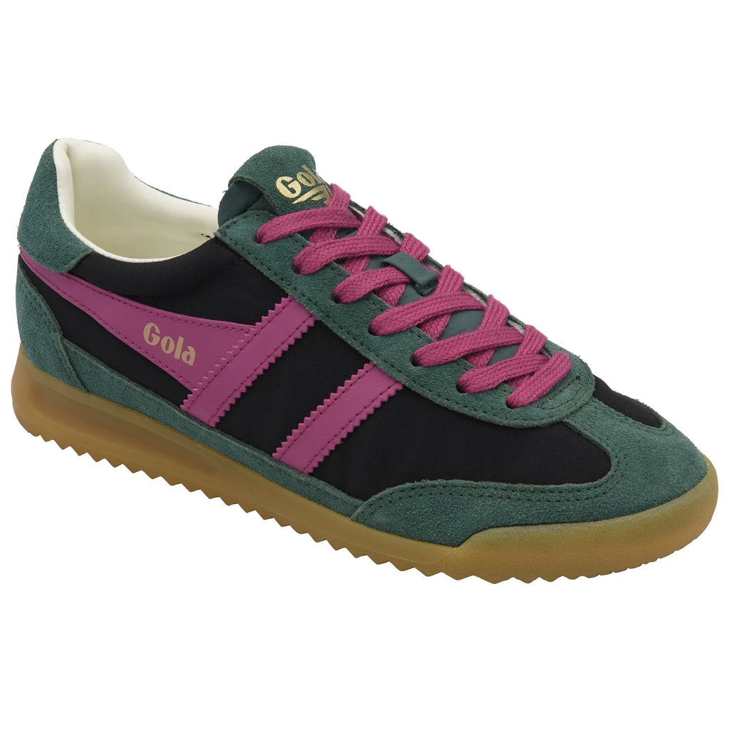 Green and black sneaker with pink accents on a white background