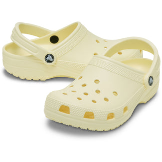 Light yellow clog shoe on a white background