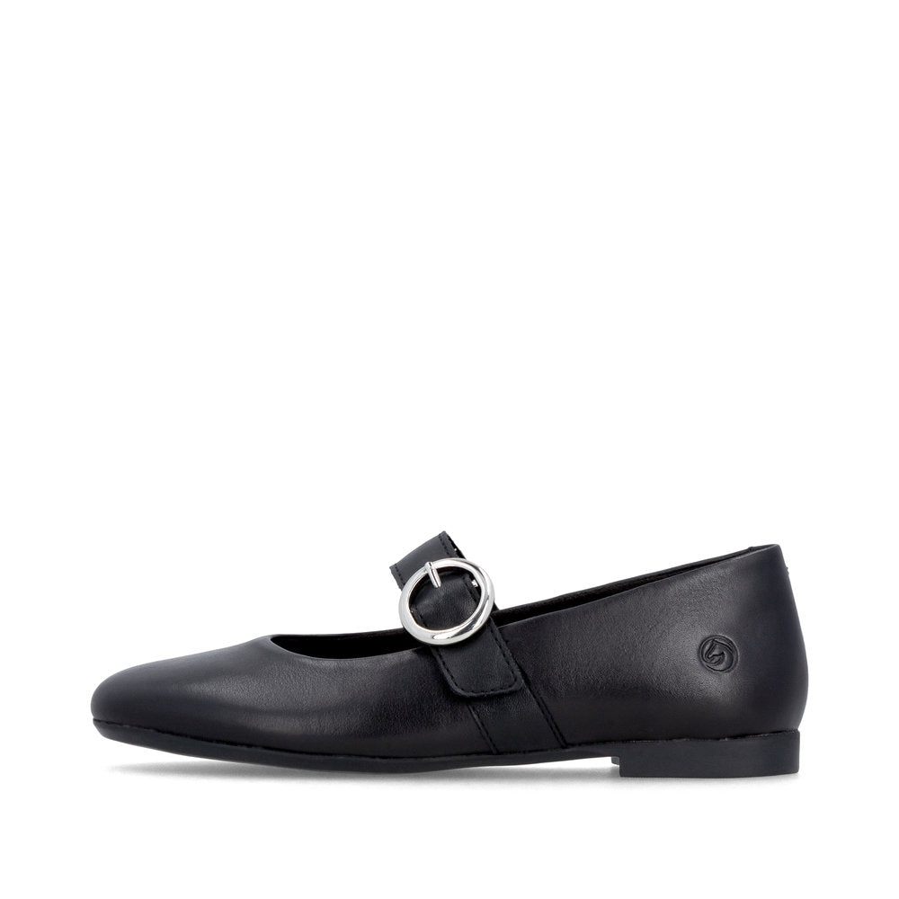 Black flat shoe with a buckle on a white background