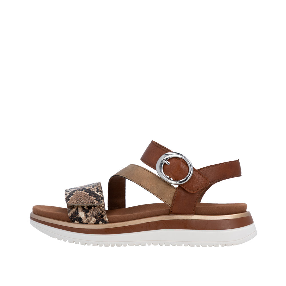 Brown sandal with snake print strap on a white background