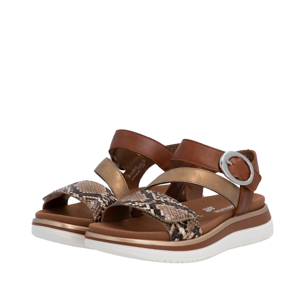Brown sandal with snake print straps on a white background