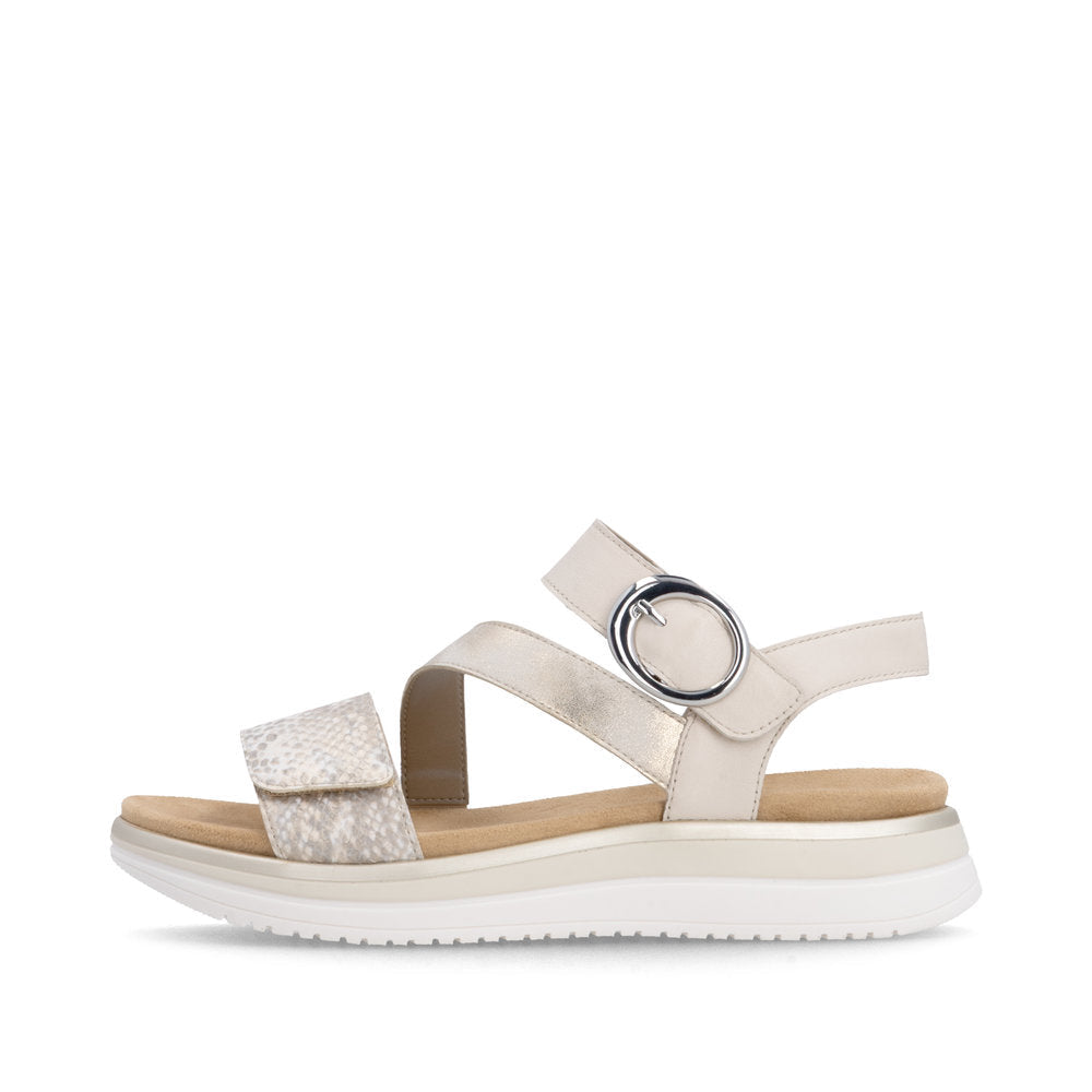 Beige sandal with a circular design on a white background