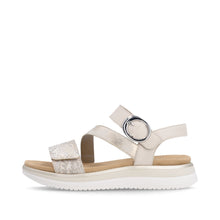 Load image into Gallery viewer, Beige sandal with a circular design on a white background
