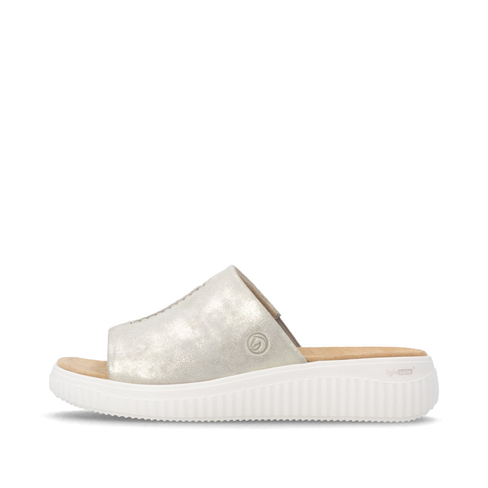 Silver sandal with a white sole on a white background