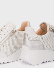 Load image into Gallery viewer, White sneakers with textured design on a light background

