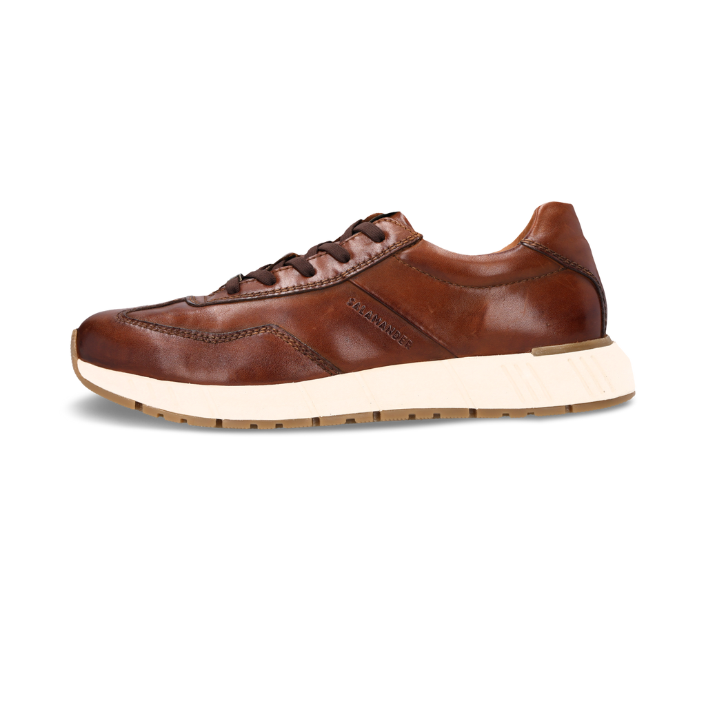 Brown leather sneaker with a white sole on a white background
