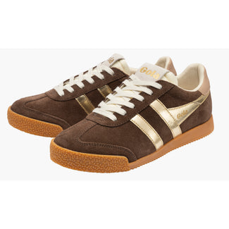 A brown suede sneaker with metallic gold stripes, white laces, and a brown gum sole, shown from a side profile on a white background.
