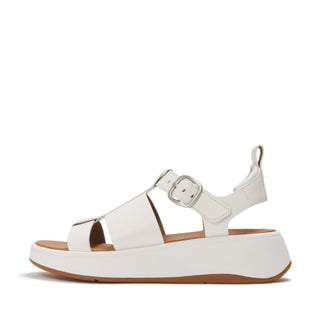 White sandal with a brown sole on a white background