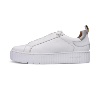 White sneaker with a thick sole on a white background