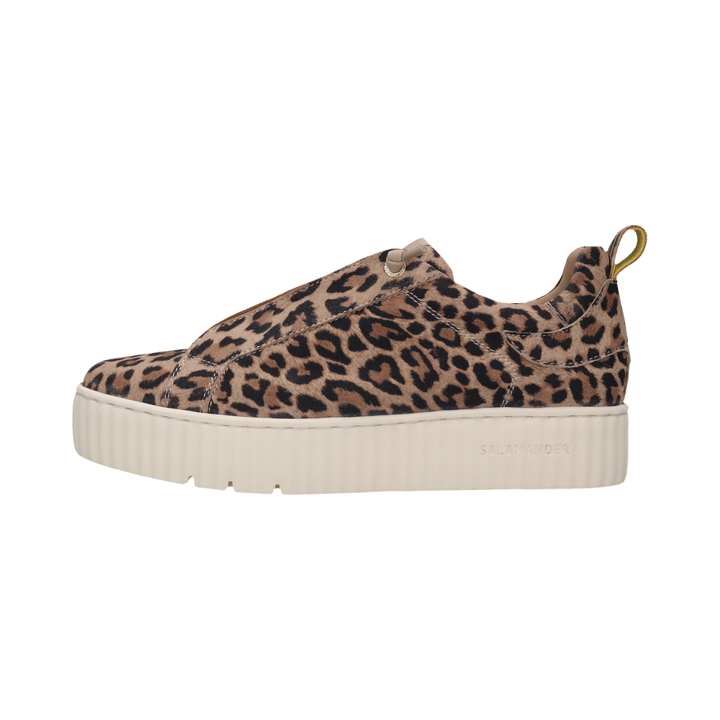 Leopard print slip-on sneaker with a thick white sole on a white background