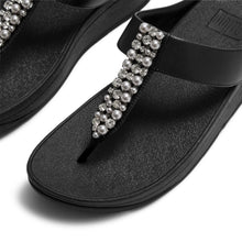 Load image into Gallery viewer, Black sandals with pearl embellishments on a white background

