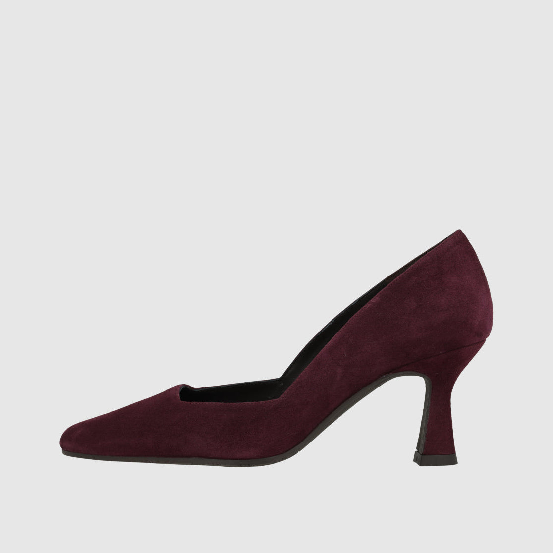 A single burgundy suede pump with a pointed toe and a flared block heel, shown in profile against a light gray background.