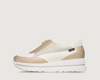 White and beige sneaker with a brand logo on a white background