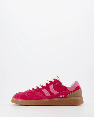 Pink sneaker with brown sole on a white background