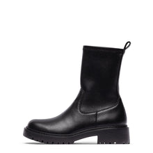 Load image into Gallery viewer, A single black leather ankle boot with a chunky lug sole and a small heel pull tab, shown in profile against a plain white background.

