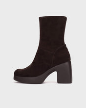 Load image into Gallery viewer, A dark brown suede ankle boot with a chunky block heel and platform sole, shown from a side profile on a light gray background.
