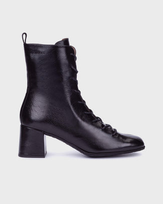 A black leather lace-up ankle boot with a chunky block heel, shown in profile against a light gray background.
