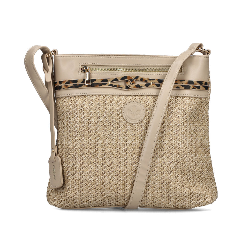 Beige handbag with a leopard print zipper on a white background