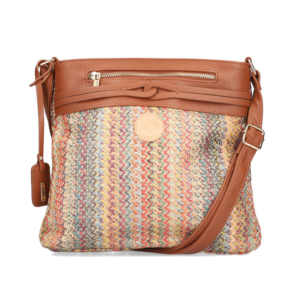 Multicolored textured bag with brown leather accents on a white background