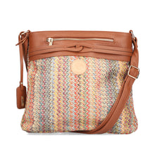 Load image into Gallery viewer, Multicolored textured bag with brown leather accents on a white background
