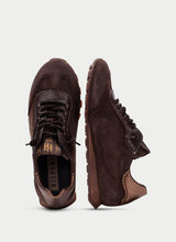 Load image into Gallery viewer, Brown suede shoes on a light gray background
