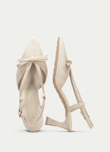 Load image into Gallery viewer, Beige high-heeled shoes with a bow on a light gray background
