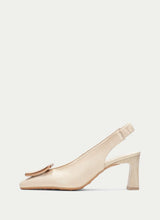Load image into Gallery viewer, Beige slingback heels on a light beige background
