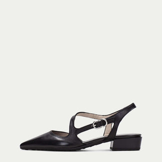 Black sandal with a thin strap on a white background