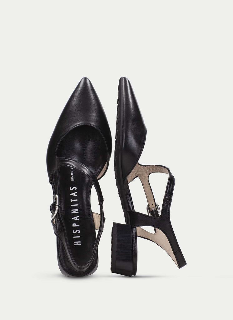 Black high-heeled shoes with 'HISPANITAS' branding on a light gray background