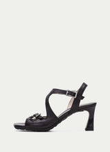 Load image into Gallery viewer, Black sandal with a high heel on a white background
