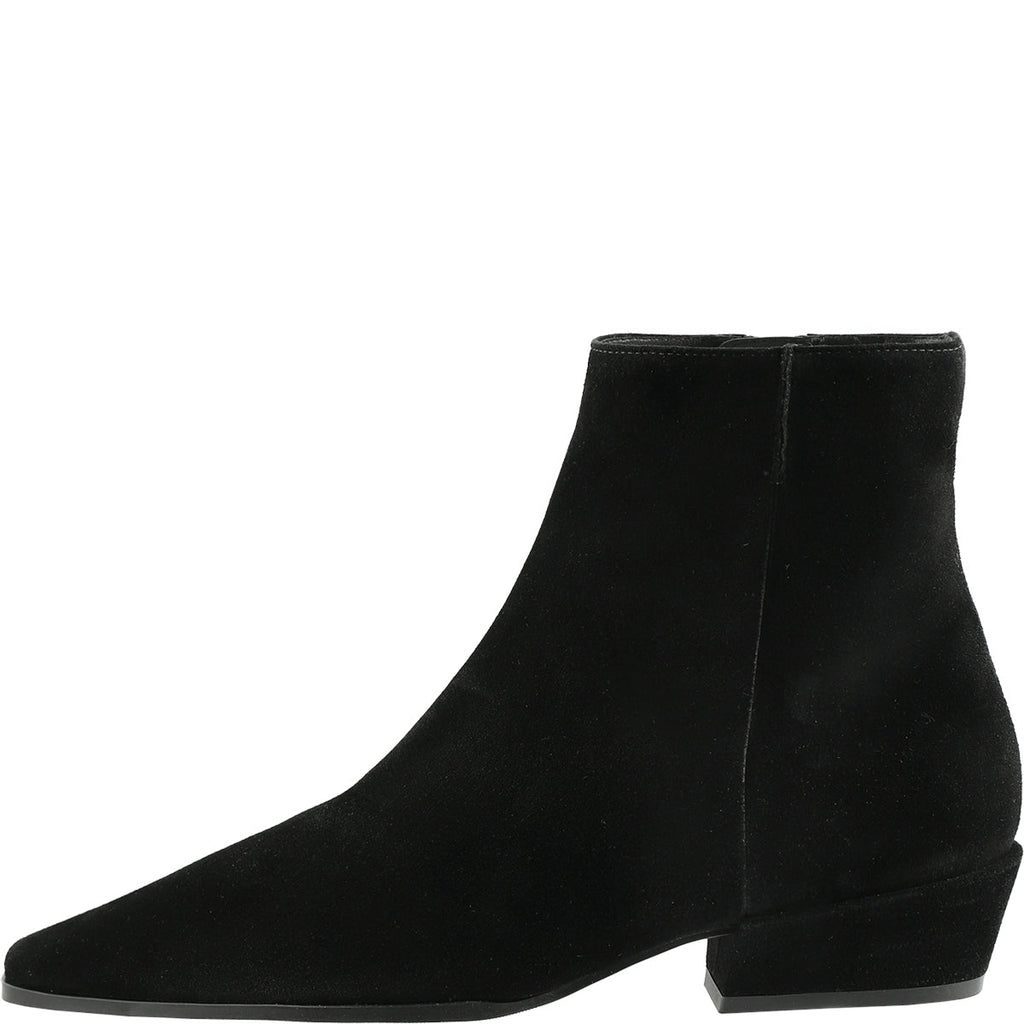 Black ankle boots on a white background