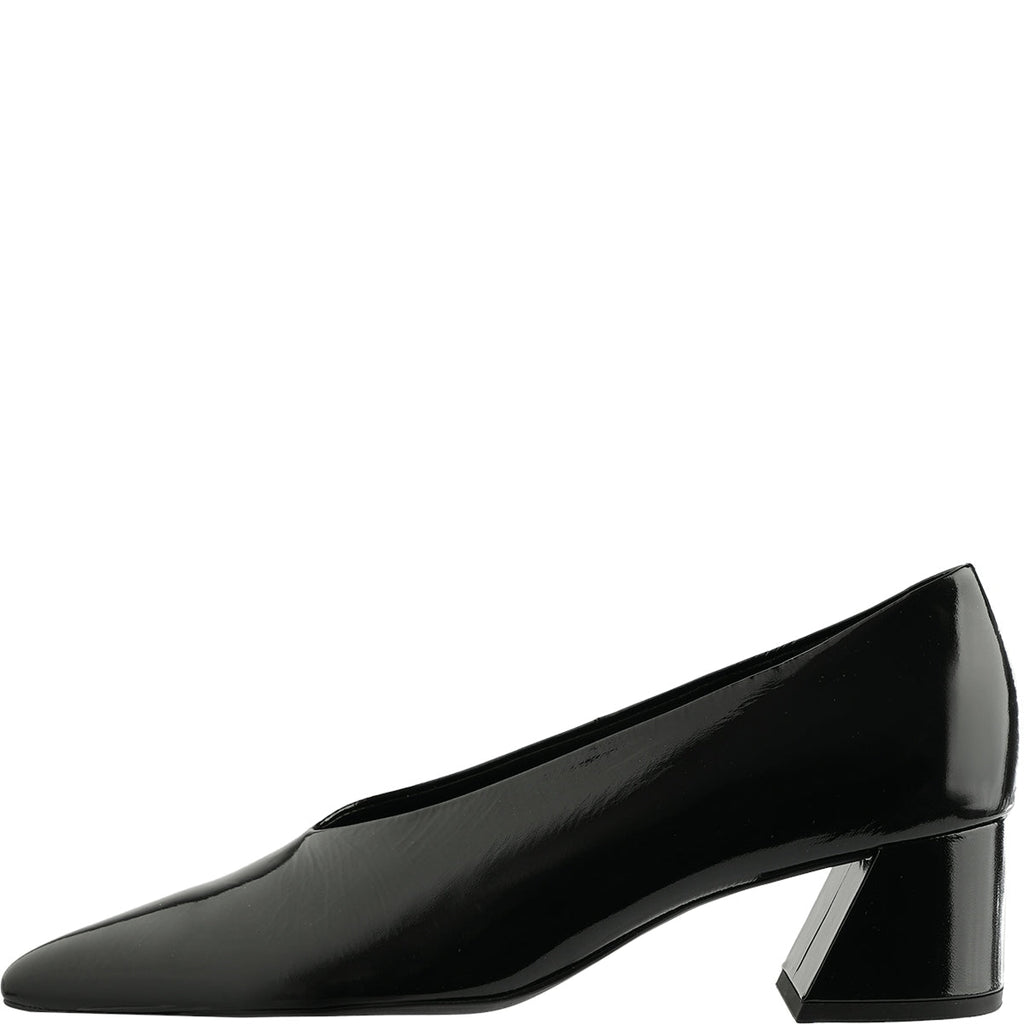 Black patent leather shoe on a white background