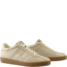 Load image into Gallery viewer, Beige sneakers with brown soles on a white background
