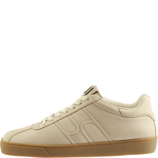 Beige sneaker with brown sole on a white background