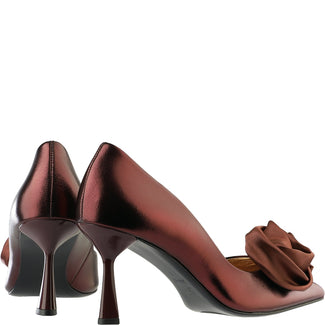 burgundy high-heeled shoe with a rose detail on a white background