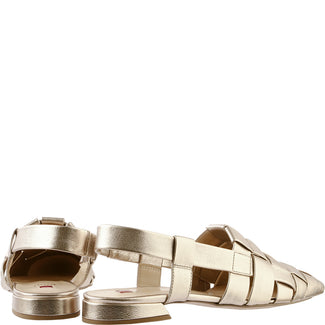 Gold sandal with woven design on a white background
