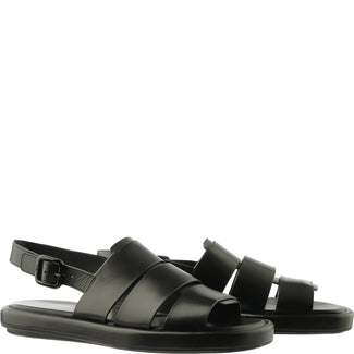 Black sandal with multiple straps on a white background