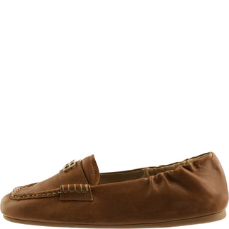 Brown leather loafer on a white background