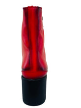 Load image into Gallery viewer, Red high-heeled shoe on a white surface with a neutral background
