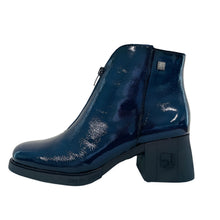 Load image into Gallery viewer, Blue patent leather ankle boot on a white surface with a light gray wall background
