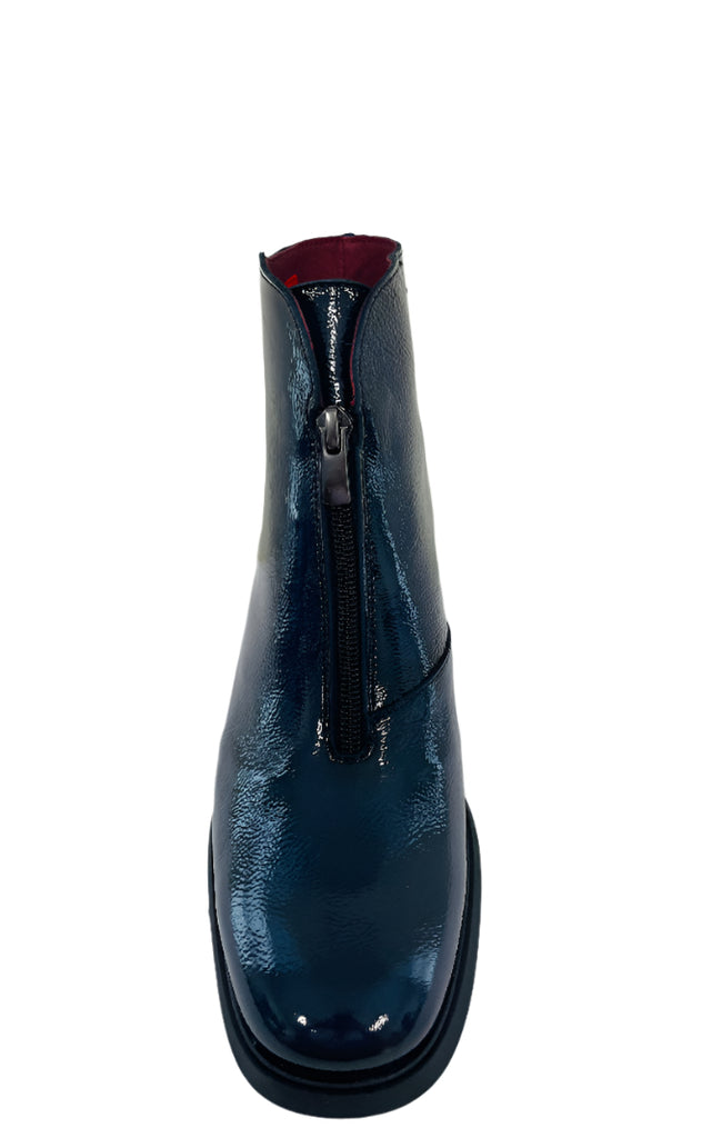 Blue patent leather boot with a zipper on a white background