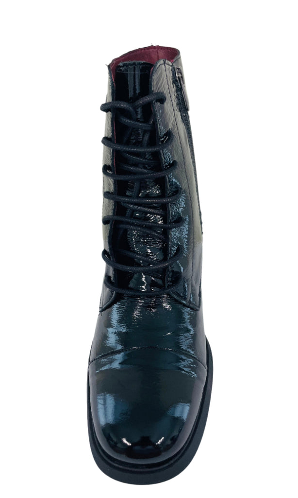 Black shiny boot on a white background