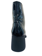 Load image into Gallery viewer, Black patent leather boot on a white surface with a light gray background
