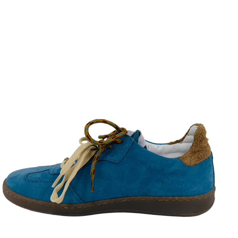 Blue suede shoe with brown accents on a white background