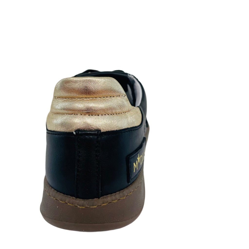 Black and brown shoe on a white background