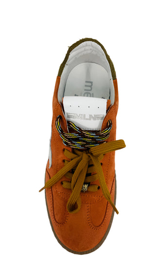 Orange sneaker with a white star on a white background