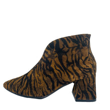 Load image into Gallery viewer, Zebra print ankle boot on a white floor with a light gray wall background
