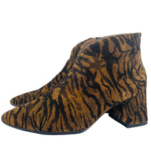 Load image into Gallery viewer, Zebra print ankle boots on a white background
