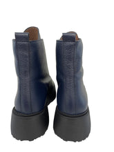 Load image into Gallery viewer, Pair of blue leather boots on a white surface
